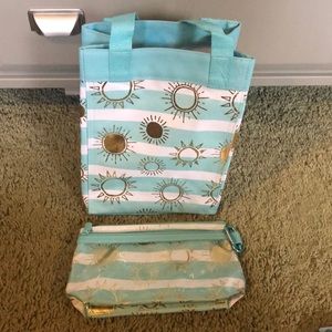 (2) thirty one items.   Tote bag and clear clip pouch